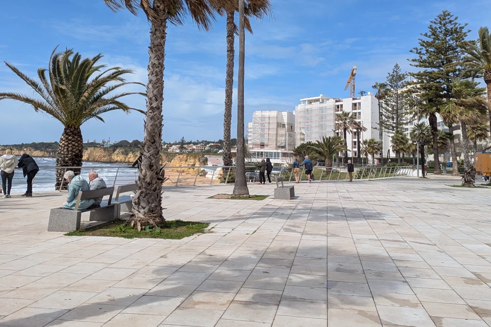 Avenida Beira Mar promenade and palm trees in Armação de Pêra, Algarve