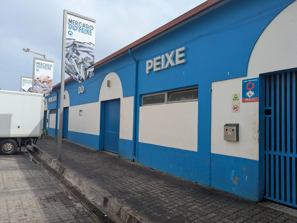 The blue and white entrance to the Mercado do Peixe, the local fish market in Quarteira.
