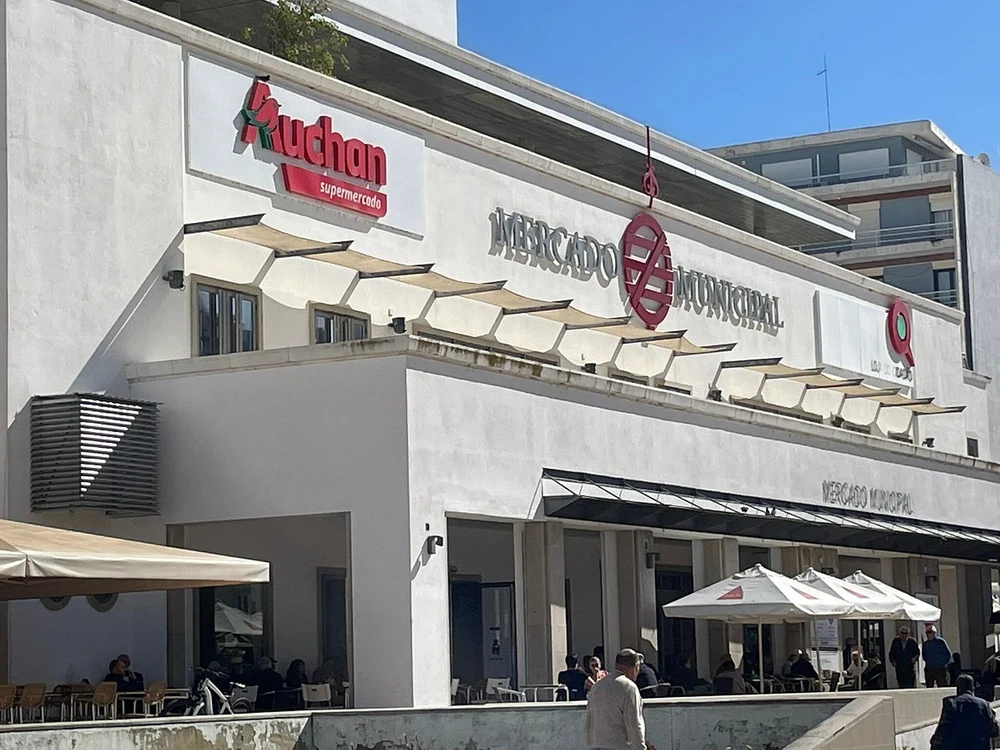 The exterior of the Mercado Municipal de Faro (Faro Municipal Market), a central hub for shopping and fresh produce.