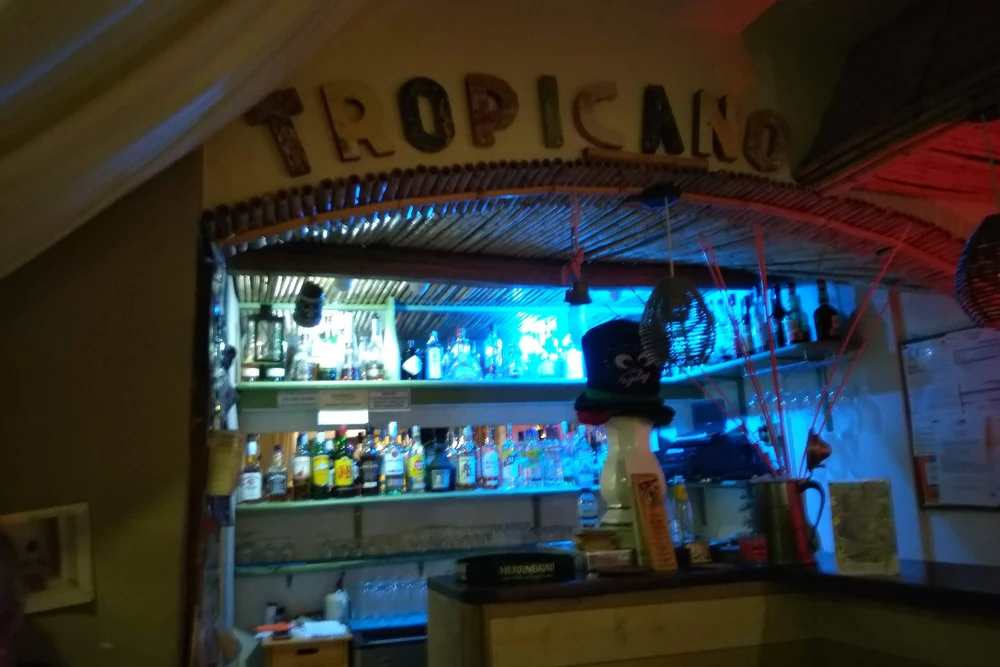 Inside the Tropicano Bar with blue lights in Armação de Pêra, Algarve