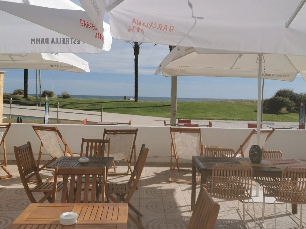 The relaxing outdoor terrace with an ocean view at the Bounty Lounge Bar in Quarteira, Portugal.