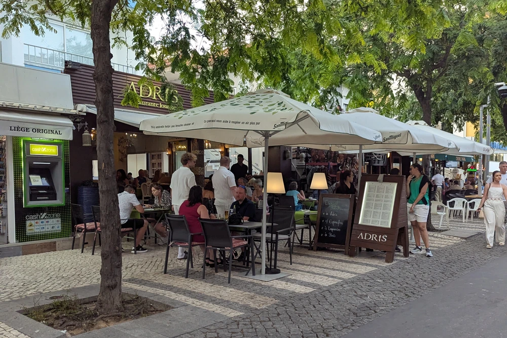 Adris Restaurant and lounge bar in Praia da Rocha, Portimão, with outdoor patio dining under umbrellas